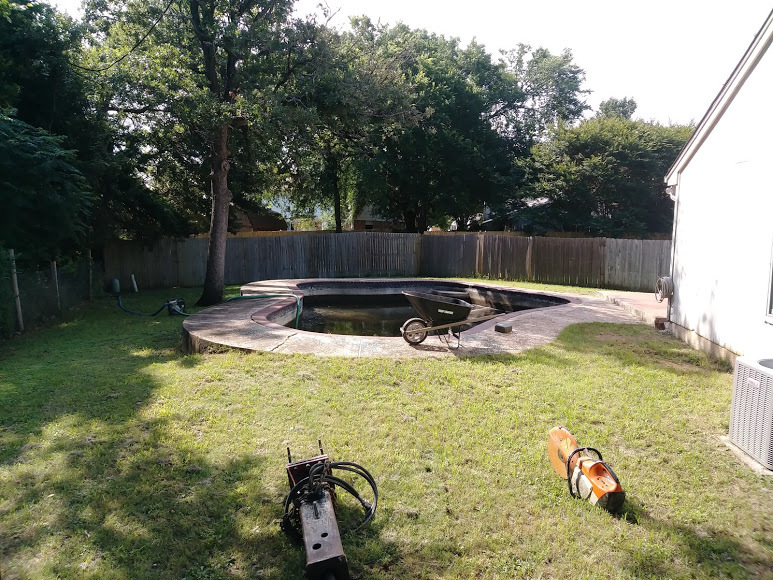 backyard with old pool